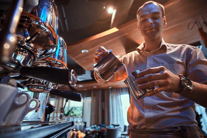 Barista Making Coffee with milk